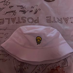 white smily bucket hat